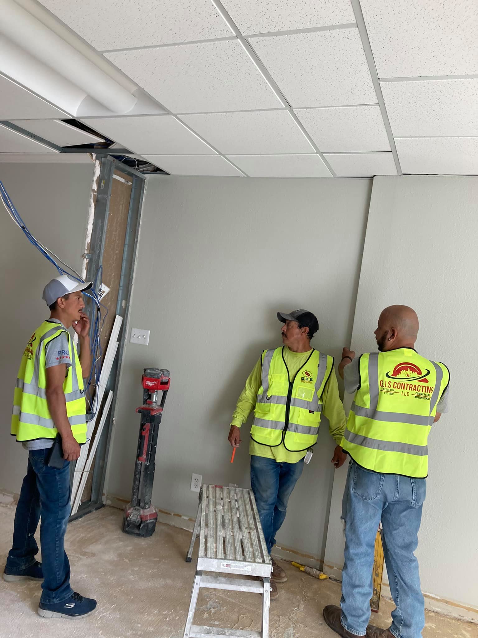 GIS Contracting crew installing a bathroom remodel in Austin